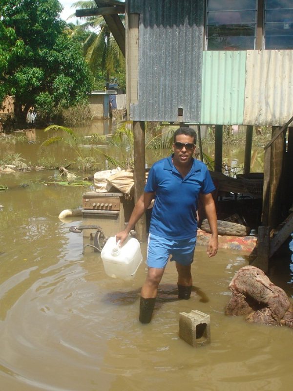 Romit distributing water in the flood zone